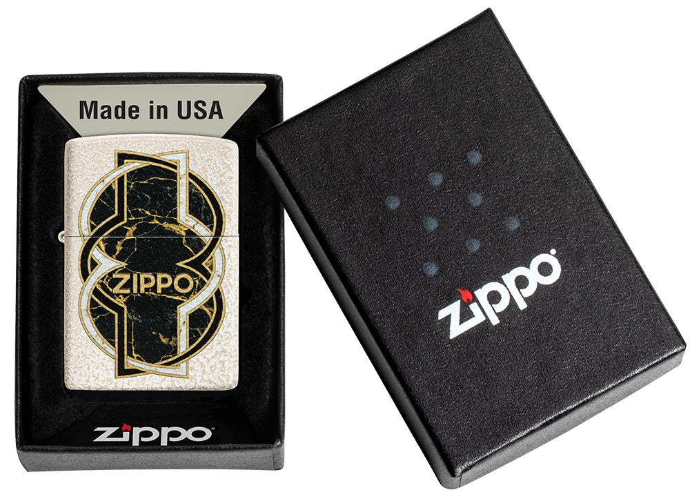 Encendedor Zippo vista frontal en blanco Mercury Glass óptico con forma de oro negro jaspeado en el centro envuelto por una línea blanca y otra negra en una caja abierta.