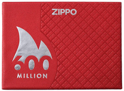 Encendedor Zippo 600 Millones vista frontal cerrada embalaje de lujo en rojo con el logotipo de 600 millones rodeado de llama blanca