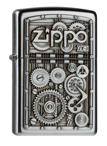 Vue de face briquet Zippo chromé avec emblème logo Zippo et nombreux petits engrenages