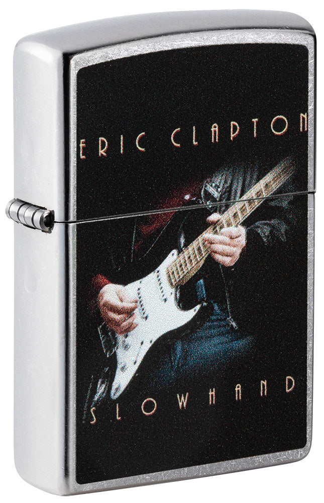 Encendedor Zippo vista frontal ¾ de ángulo cromado con imagen coloreada de Eric Clapton tocando la guitarra