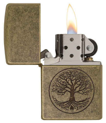 Briquet Zippo laiton antique gravure arbre de vie, ouvert avec flamme