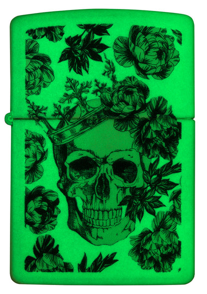 Encendedor Zippo Vista frontal Calavera fluorescente con corona rodeada de flores azules