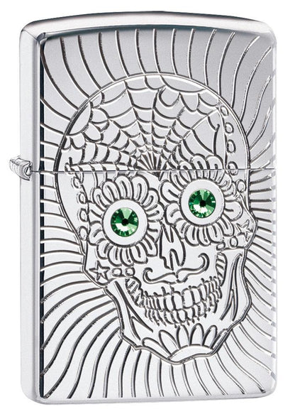 Vue de face 3/4 briquet Zippo avec gravure profonde tête de mort et yeux en éléMen,ts Swarovski