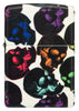 Vista frontal del encendedor Skulls Design con unas calaveras multicolores brillando en la noche